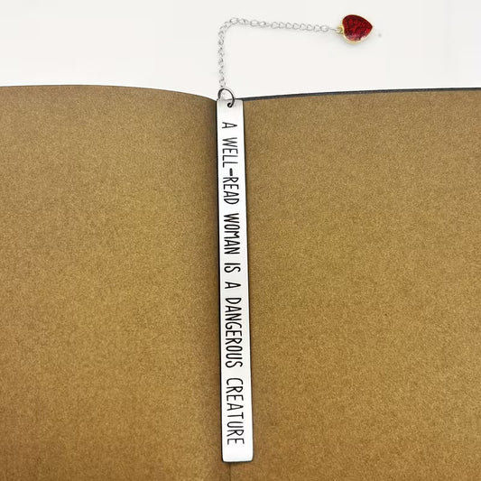 A well-read woman is a dangerous creature -metallikirjanmerkki
