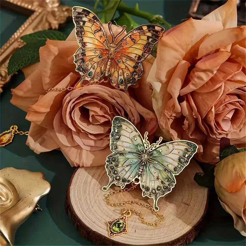 Metalliset perhoskirjanmerkit, joissa on kultainen ontto kuvio ja öljymaalausaihe, sisältää riipusketjun