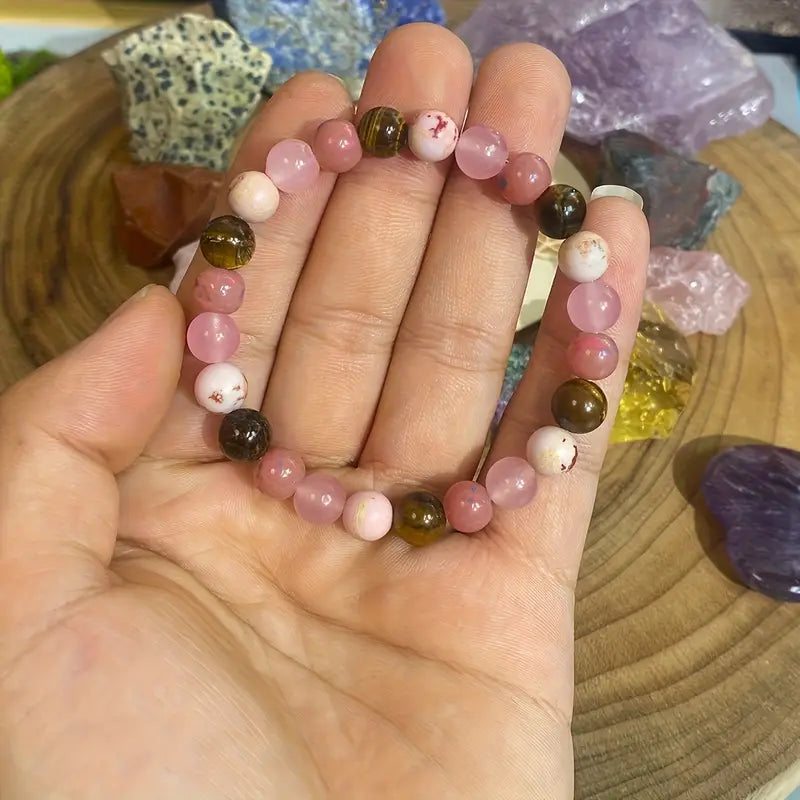 Luonnollinen tiikerinsilmäkivinen joustava rannekoru vaaleanpunaisilla helmillä ahdistukseen