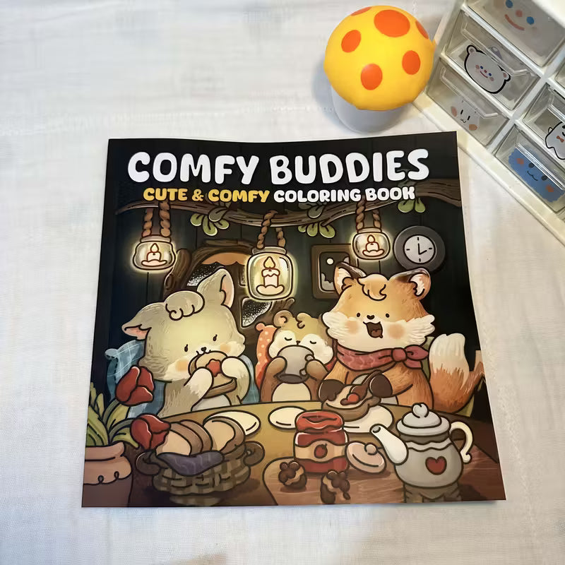 Comfy Buddies 30 Days -värityskirjan kansikuva. Kuvassa söpöjä eläinhahmoja rentoutumassa ja puuhailemassa lämpimässä ja kotoisassa ympäristössä.