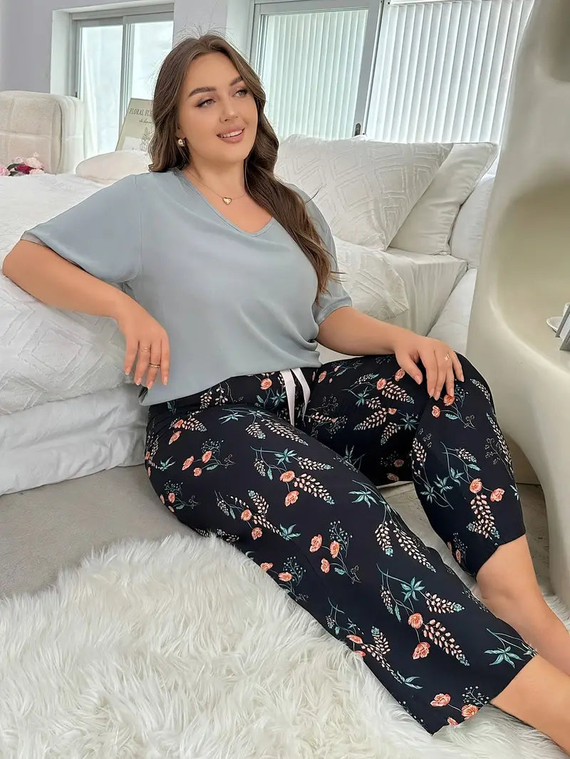 100 % puuvillaa Pyöreäkauluksinen lyhythihainen housupuku khakinsinisenä