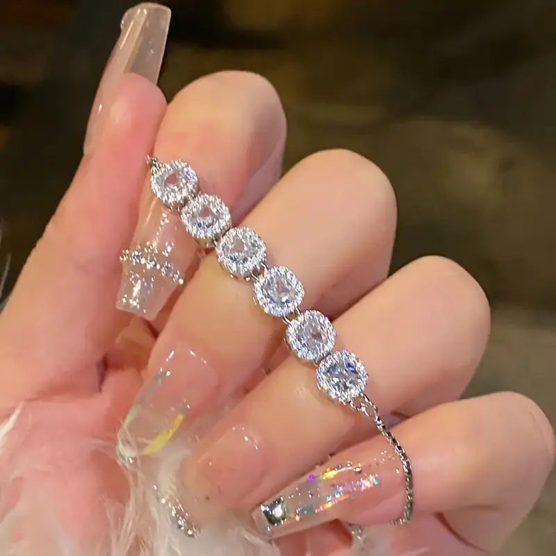 925 hopeoitu rannekoru kimaltelevilla 5A zirkoniumhelmillä