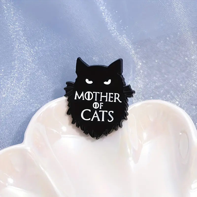 Emalinasta vaatteisiin tai laukkuihin kiinnitettäväksi