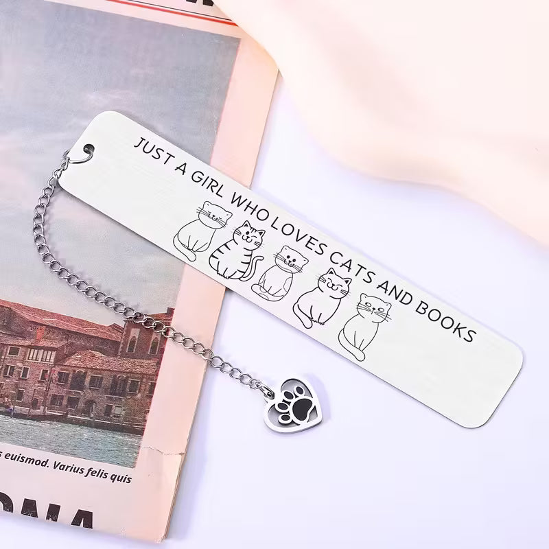 Stainless steel bookmark with the text 'Just a Girl Who Loves Cats and Books' and cat designs.