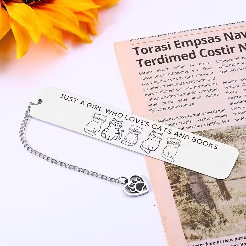 Stainless steel bookmark with the text 'Just a Girl Who Loves Cats and Books' and cat designs.