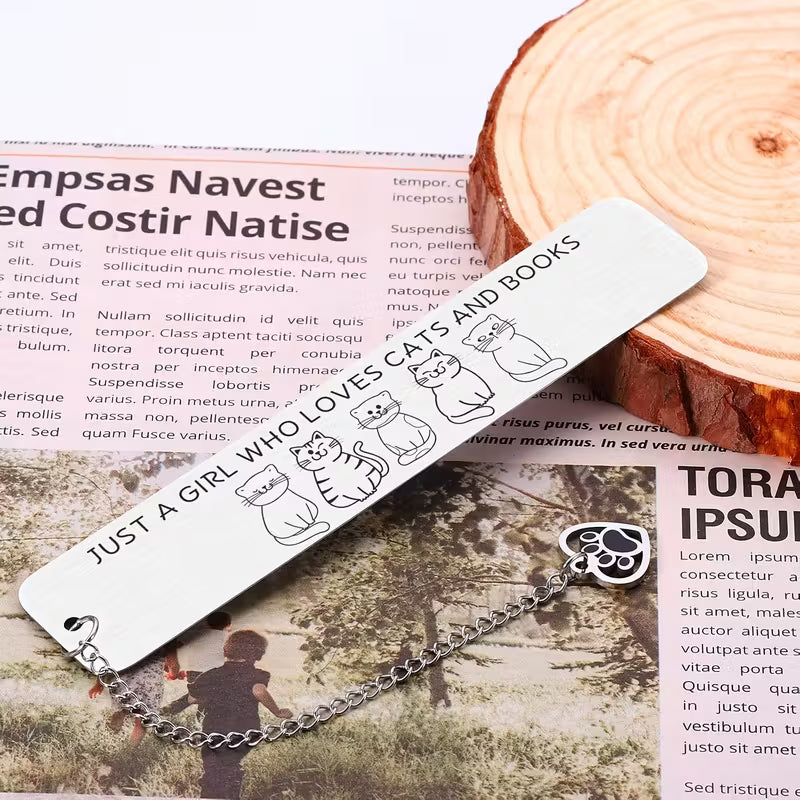 Stainless steel bookmark with the text 'Just a Girl Who Loves Cats and Books' and cat designs.