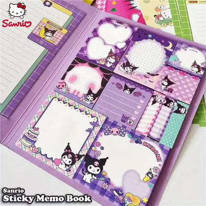 Avattu lila Sanrio Kuromi -muistilappukirja, joka sisältää useita erikokoisia ja -muotoisia Kuromi-aiheisia muistilappuja ja kirjepaperia.